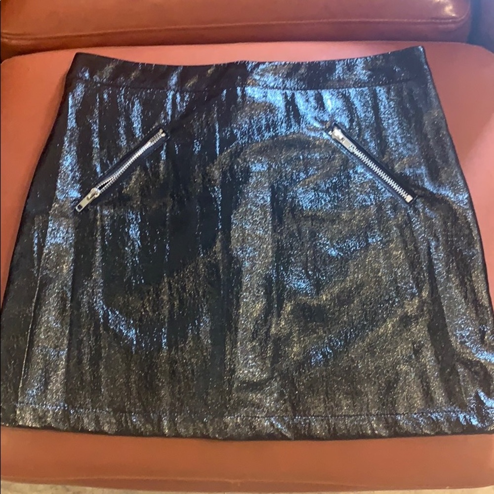 Never worn faux leather skirt with pockets